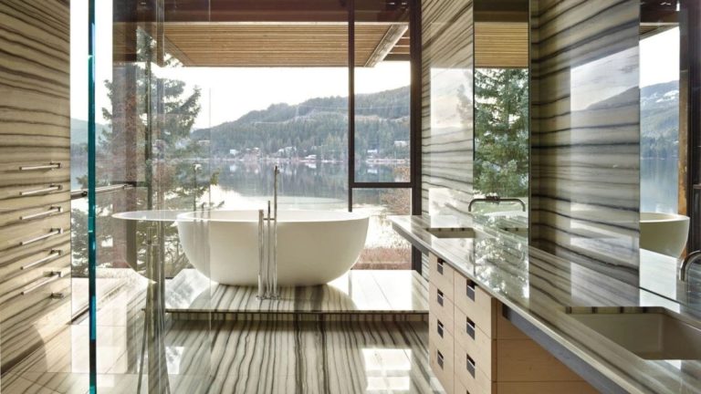 olson-kundig-modern-lake-house-bathroom-linear-veined-stone-freestanding-bath