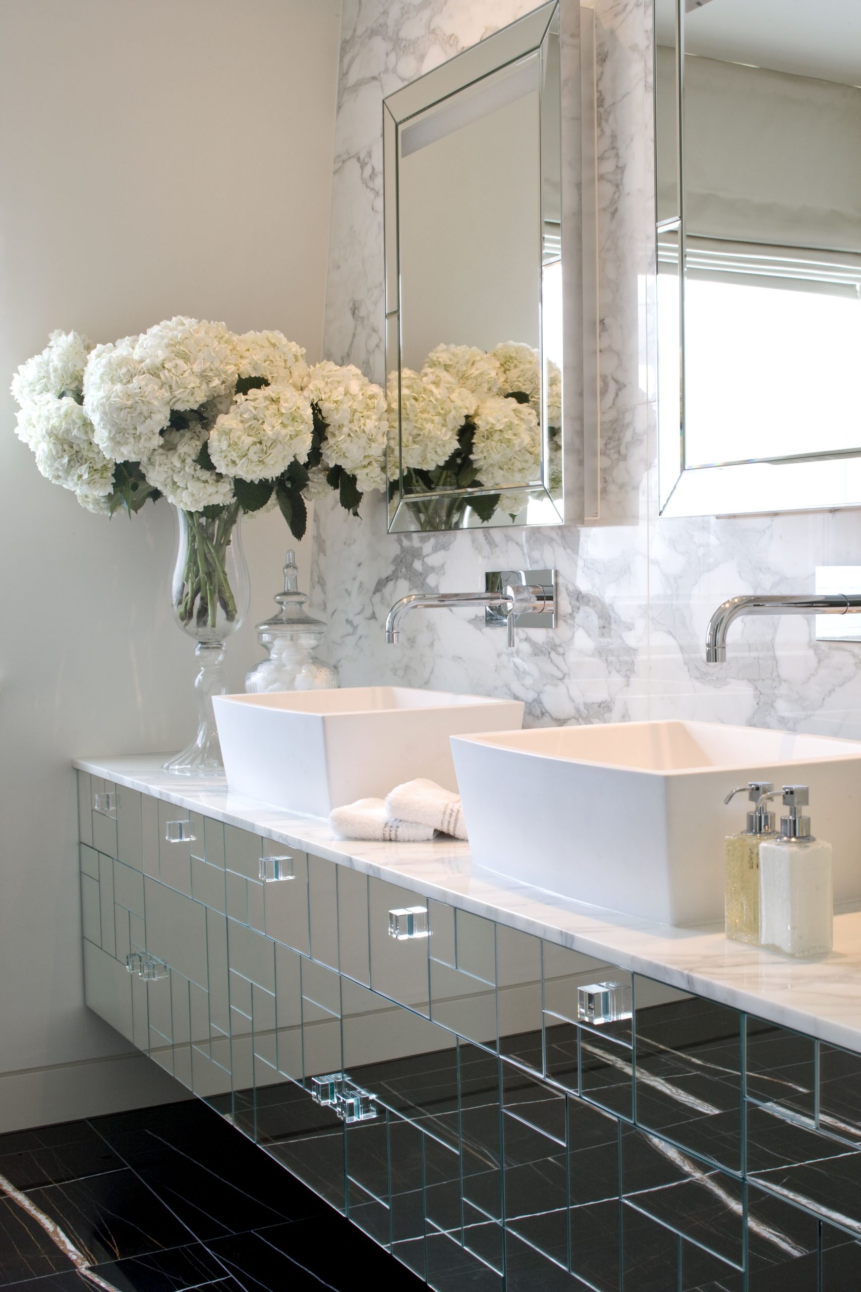 double-vanity-marble-bathroom-mirrored-cabinetry-luxury