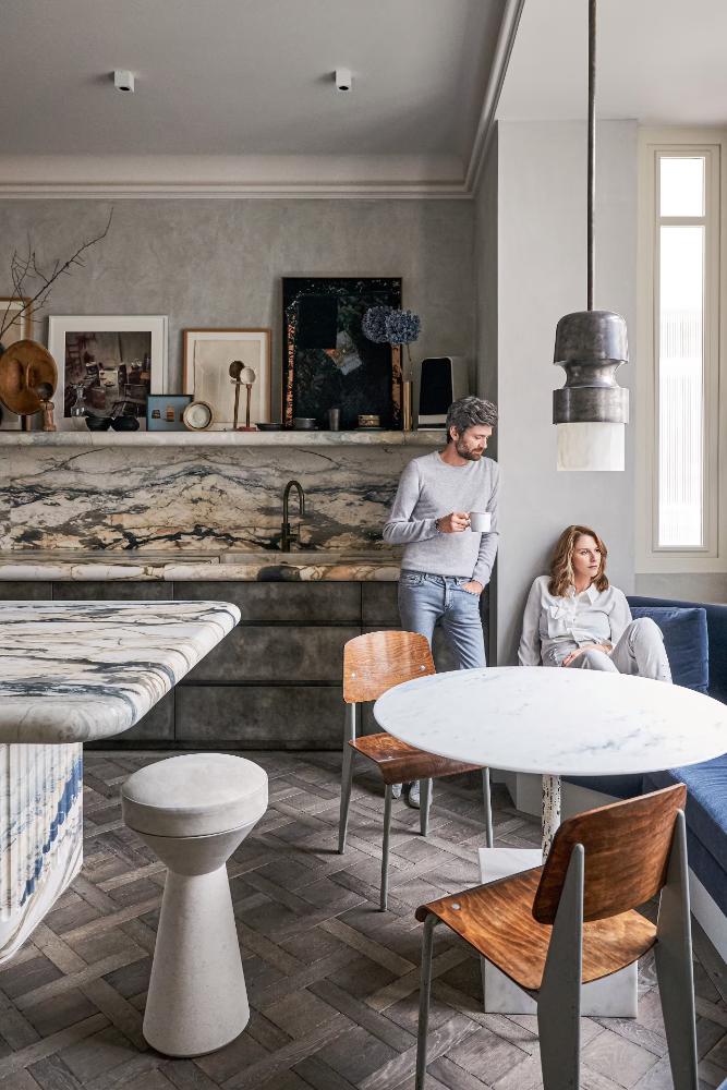 joseph dirand contemporary marble kitchen sculptural stone island veined splashback