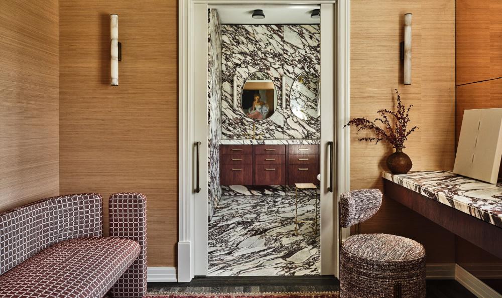 kelly-wearstler-bold-veined-marble-bathroom-layered-stone-walls-timber-vanity
