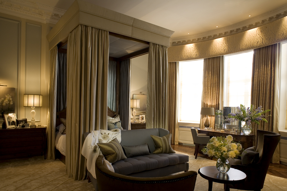 primary-suite-sitting-area-drapery-layered-luxury-interior